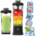 A portable electric blender shown in a clean studio composition, with one tall blender filled with layered fresh fruits and one shorter blender filled with a green smoothie. To the right, stacked ice cubes contain strawberries, blueberries, cherries, and peaches, with mint leaves and melting ice at the bottom, all on a white background.